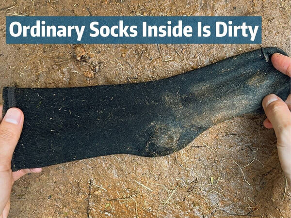 Inside of ordinary socks covered with dirt and mud